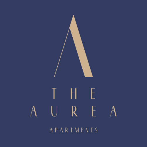 a triangular logo on a blue background with a gold
